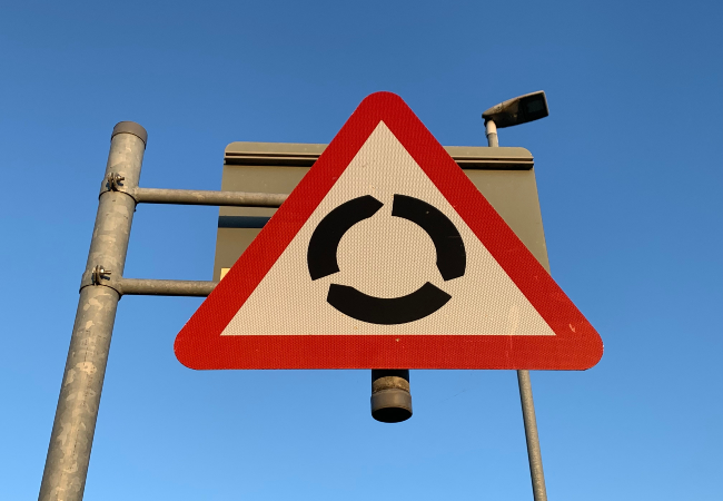 Mini roundabout vs roundabout sign
